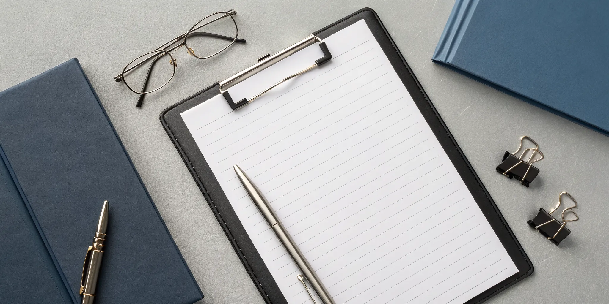 A witness interview form on a clipboard with a pen, prepared for taking notes.